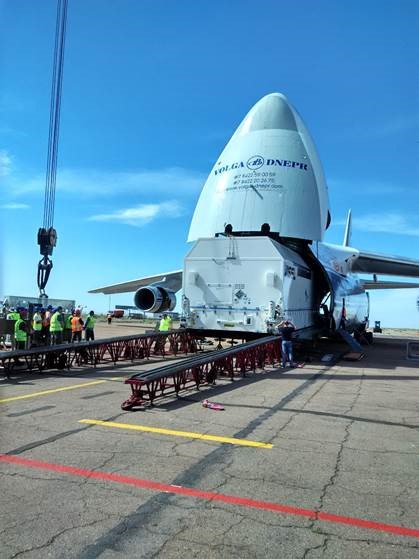 Offloading the AsiaSat 9 container from a transport aircraft at the Baikonur airport