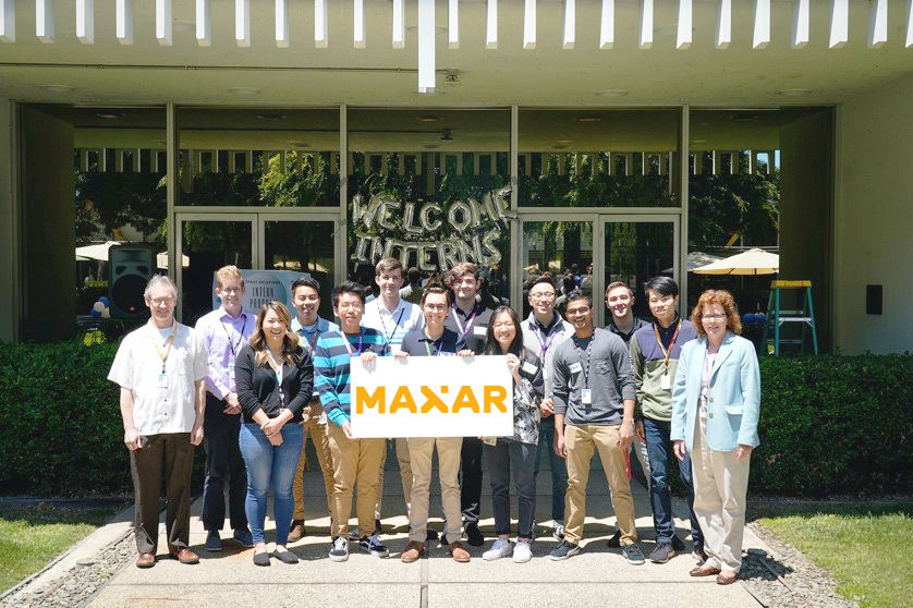 Interns with Maxar logo